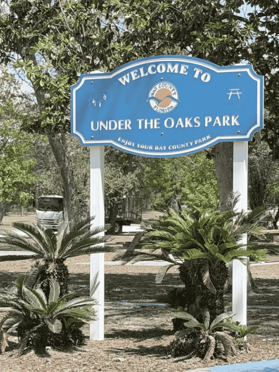 welcome sign of under the oaks park near nautical point rv park in panama city fl